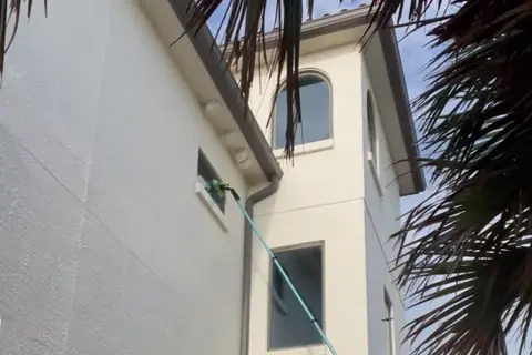 Pure water window cleaning with a water-fed pole by The Stream Team